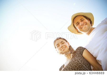 Happy couple enjoying sunny day Happy couple enjoying sunny day 63446669