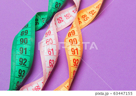 Perspective view of spiral colorful measure tapes 63447155