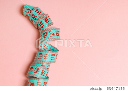 Rolled tape measure with space for your design. 63447156