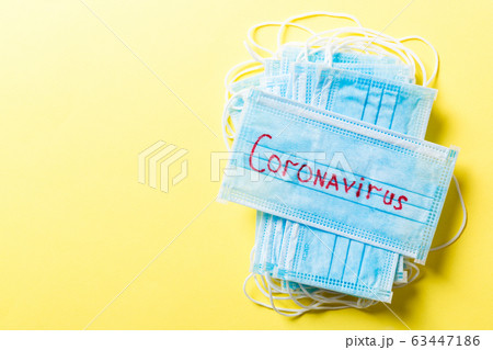 Top view of pile of protective medical masks with 63447186