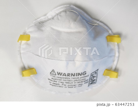 White protective hygenic mask isolated backgrounds for doctors and patient from virus biological infection and PM2.5 dust, pandemic news White protective hygenic mask isolated backgrounds for doctors and patient from virus biological infection and PM2.5 dust, pandemic news 63447253