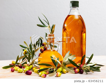 Olive oil in decanters and bottles 63456211