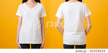 woman in blank white t-shirt isolated on yellow background, back views of mock up for design print. 63458026