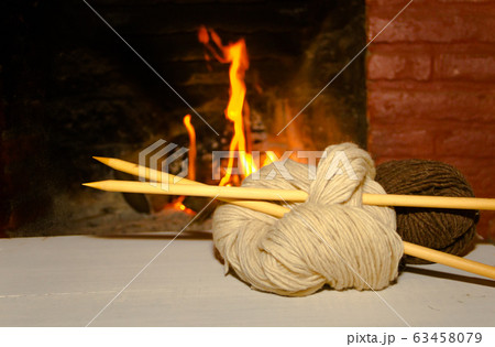 winter concept knitting wool and tricot needles 63458079