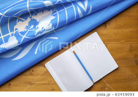 Close-up of the UN blue flag Close-up of the UN blue flag 63459093