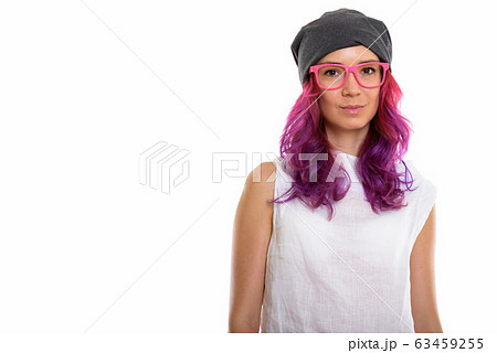 Studio shot of young beautiful woman wearing pink eyeglasses 63459255