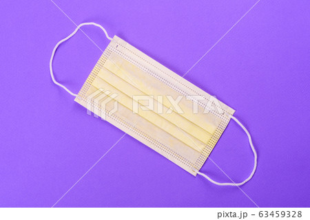 Medical mask on a colored background Medical mask on a colored background 63459328