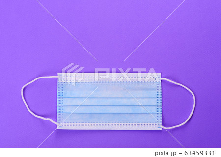 Medical mask on a colored background Medical mask on a colored background 63459331