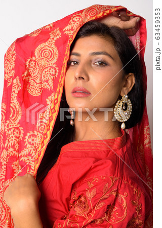 Face of young beautiful Persian woman in traditional clothing 63459353