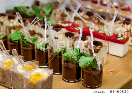 Different sets of desserts in glasses Different sets of desserts in glasses 63460336