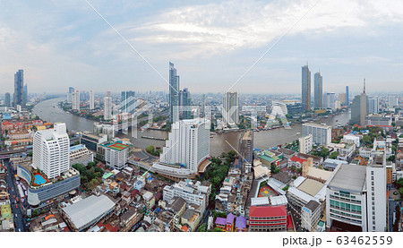 Aerial view of boats and Taksin Bridge with Chao 63462559