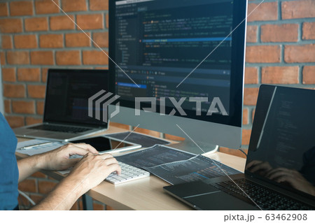 Asian man working code program developer computer 63462908