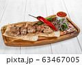 Grilled pork kebab with vegetables and red sauce  63467005