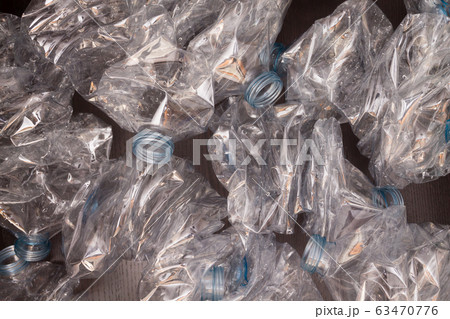 Plastic bottles background. Empty bottles on black 63470776