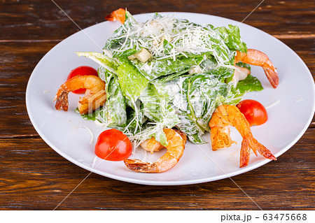 Salad with royal shrimp, lettuce leaves, parmesan cheese 63475668