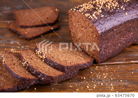 Sliced with pieces of black bread with tmina 63475670