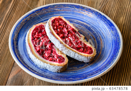 Slices of cherry strudel 63478578