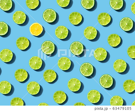 One out unique lemon surrounded by limes One out unique lemon surrounded by limes 63479105