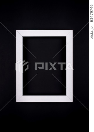 White text frame on a black background. 63479746