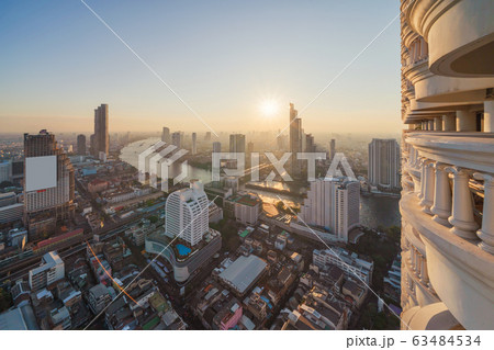 Aerial view of boats and Taksin Bridge with Chao Aerial view of boats and Taksin Bridge with Chao 63484534
