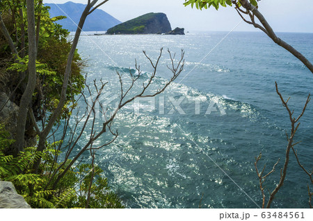 Sea view from the mountain. Waves and an island in Sea view from the mountain. Waves and an island in 63484561