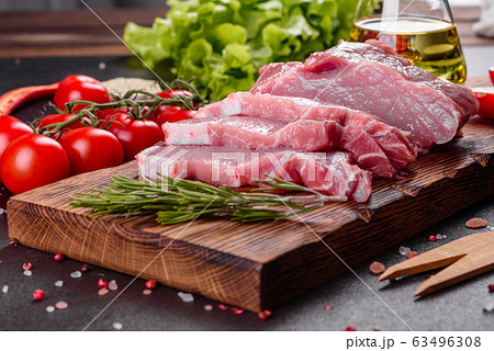 Fresh pieces pork ready to cook Fresh pieces pork ready to cook 63496308