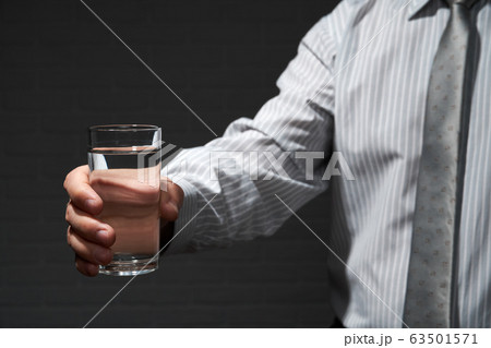 Businessman closeup portrait, he standing and 63501571
