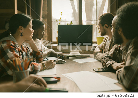 Teamwork Of Young Freelancers In Sunny Coworking Space Teamwork Of Young Freelancers In Sunny Coworking Space 63503822