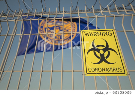 Coronavirus warning sign on the barbed wire fence against flag of Nebraska. COVID-19 quarantine related 3D rendering 63508039