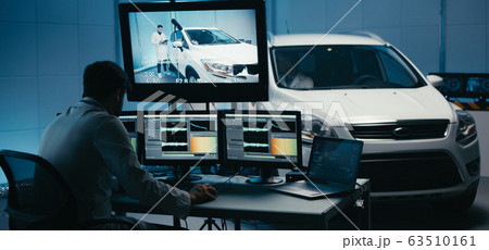 Engineers working in test chamber 63510161