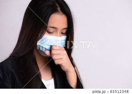 Close up of a businesswoman in a suit Close up of a businesswoman in a suit 63512348
