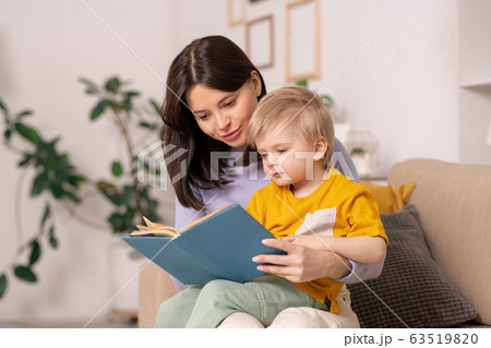 Reading fairy tale to son 63519820