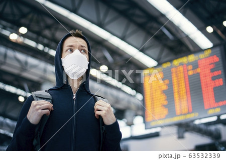 Man wearing protection face mask at airport Man wearing protection face mask at airport 63532339