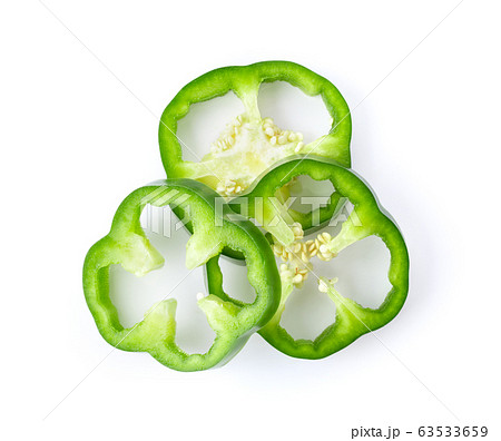 sliced green bell pepper isolated on white background. top view 63533659