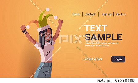 first april fool day girl wearing funny jester hat holiday celebration concept horizontal portrait copy space first april fool day girl wearing funny jester hat holiday celebration concept horizontal portrait copy space 63538489