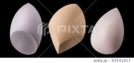 Set of makeup tool sponges or beauty blender isolated on black background Set of makeup tool sponges or beauty blender isolated on black background 63541917