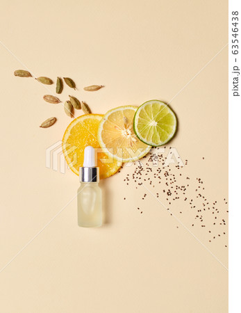Beauty Concept. Hyaluronic acid citrus and seeds isolated on pink 63546438