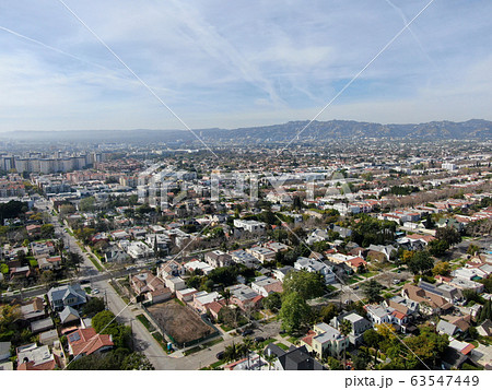 Aerial view of wealthy area with big houses in Central Los Angeles  63547449