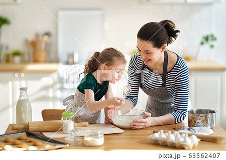 family are preparing bakery together family are preparing bakery together 63562407