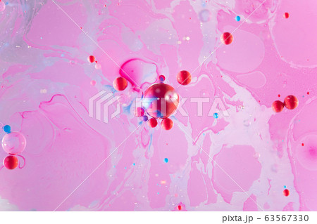 Close up of mixed oil, water and colors abstract background 63567330