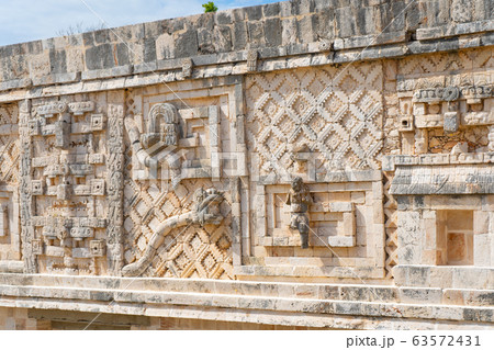 Fragment of the Governor's Palace (Nunnery Quadrangle). Uxmal an ancient Maya city of the classical period. Travel photo. Yucatan. Fragment of the Governor's Palace (Nunnery Quadrangle). Uxmal an ancient Maya city of the classical period. Travel photo. Yucatan. 63572431