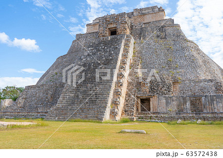 The Adivino (the Pyramid of the Magician or the Pyramid of the Dwarf). Uxmal an ancient Maya city of the classical period. Travel photo. Yucatan. The Adivino (the Pyramid of the Magician or the Pyramid of the Dwarf). Uxmal an ancient Maya city of the classical period. Travel photo. Yucatan. 63572438