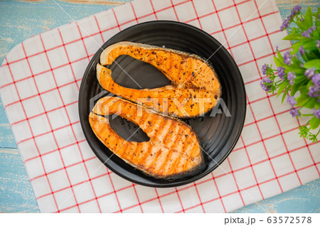 Cooked salmon steaks 63572578