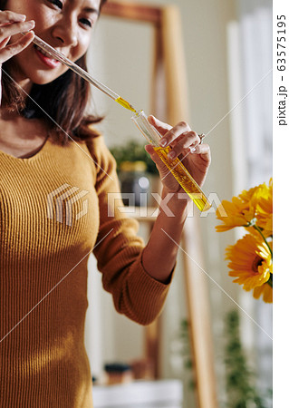 Woman working with diluted colorant 63575195