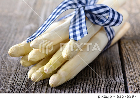 White asparagus from Germany on a wooden table White asparagus from Germany on a wooden table 63576597