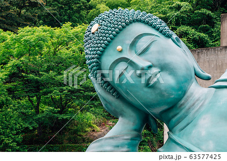 Bronze buddha statue in Nanzo-in Temple, Fukuoka, Japan 63577425