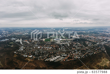 aerial photo of West part of Berlin with Olympic Stadium in cloudy weather aerial photo of West part of Berlin with Olympic Stadium in cloudy weather 63577988