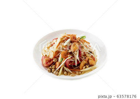 Spicy papaya salad northeast Thai food on white Spicy papaya salad northeast Thai food on white 63578176
