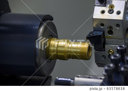 The operation of CNC lathe machine . The operation of CNC lathe machine . 63578638
