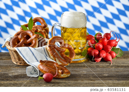 Radishes with pretzels and Bavarian beer mug 63581131